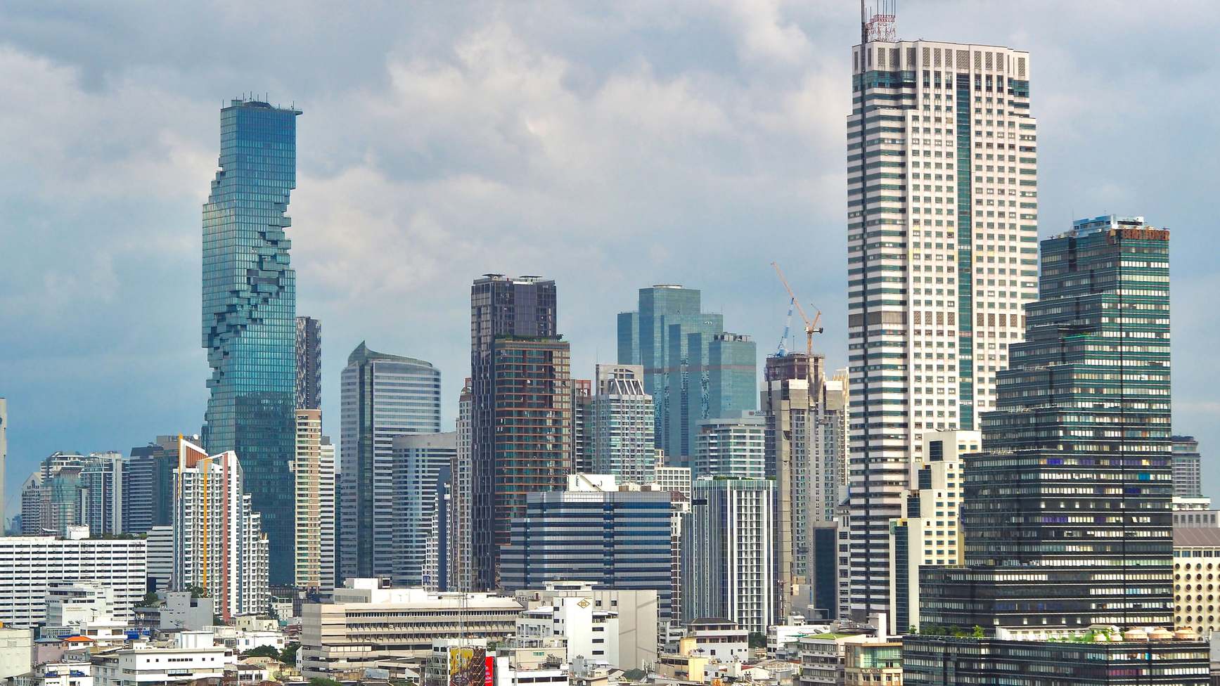 Bangkok city skyline with office towers on a cloudy day